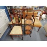 A set of three Edwardian inlaid mahogany chairs with labels for James Philips & Sons, a Victorian