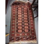 A vintage Bokhara rug, 136cm x 80cm Location: A3