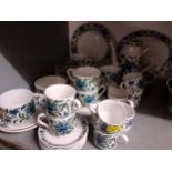 A mid 20th century Midwinter part dinner, tea and coffee set having a white ground with blue flowers