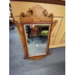 A 19th/20th century burr walnut fretwork mirror 74cm x 46cm Location: A2