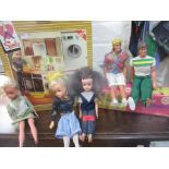 Sindy related items to include a 1970's boxed sideboard, a kitchen and three 1970's Sindy dolls A/