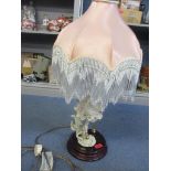 A Naples Florence figural lamp with beaded shade Location: A3