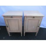 A pair of modern French style painted bedside cabinets having brush slide above single cupboard door