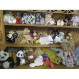 A selection of stuffed animals and dolls to include a Merrythought bear, a Steiff Manschli panda and