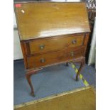 An early 20th century bureau together with a Scotts of Stow reproduction Bentwood chair with