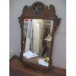 A 19th century walnut framed mirror with fretwork ornament, 74.5cm h x 44.5cm w Location: