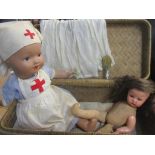 A vintage British bisque doll in nurses uniform A/F together with a German H.J.L doll with bisque