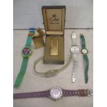 Two lighters to include a Caran Dache, a Calibri lighter boxed and five watches to include Swatch