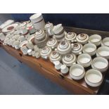 A 1970's Denby stoneware cream and brown part dinner, tea and coffee service, at least 6 setting