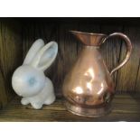 A Denby glazed model rabbit and a copper 1/2 gallon measuring jug Location: