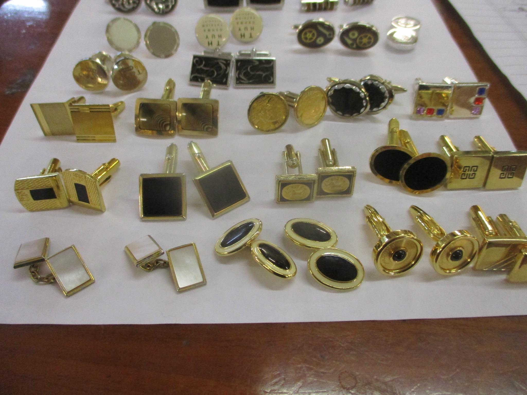 A collection of mixed modern gold tone and silver tone cuff links to include Colibri and silver - Image 2 of 3