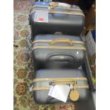 A set of three Samsonite graduating suitcases, titanium colourway, Hommage design, new with original