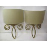 A pair of modern Jim Lawrence gilt painted wall lights Location: