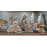 A Group of nine figures to include The Leonardo Collection, Nao and Lladro Location: 4.1