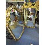 Late 19th/early 20th century gilt framed wall mirror with scrolled leaf and husk decoration, 97cm
