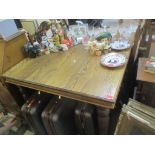 An oak dining table together with a set of eight chairs Location: RAM