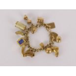 A 9ct gold charm bracelet with thirteen charms, set on a curb link chain, 56.5g