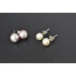 Two pairs of pearl earrings, each set with a diamond, one pair with pink/grey pearls, 9.5mm, the