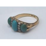 An 18ct gold turquoise and diamond ring, having three turquoise stones and eight diamonds, largest