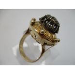 A 18th century gold coloured metal and diamond ring, the domed top set with eight old mine cut
