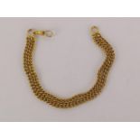 A 9ct gold two strand curb link bracelet, with makers mark, M.P.G, 18.4g