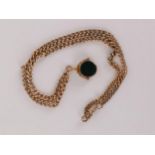 A 9ct gold mounted bloodstone pendant, swivel fob set on a 9ct gold curb link necklace, with