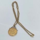 A 1979 full sovereign in a 9ct gold mount on a 9ct belcher link necklace, total weight 14.2g