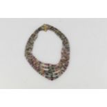 A five row multi-coloured faceted tourmaline bead necklace, the clasp stamped 375, tested as gold,