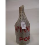 A single bottle of Amandio's 1938 vintage port, in original paper wrapper