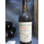 A single bottle of Graham's Malvedos vintage port 1965