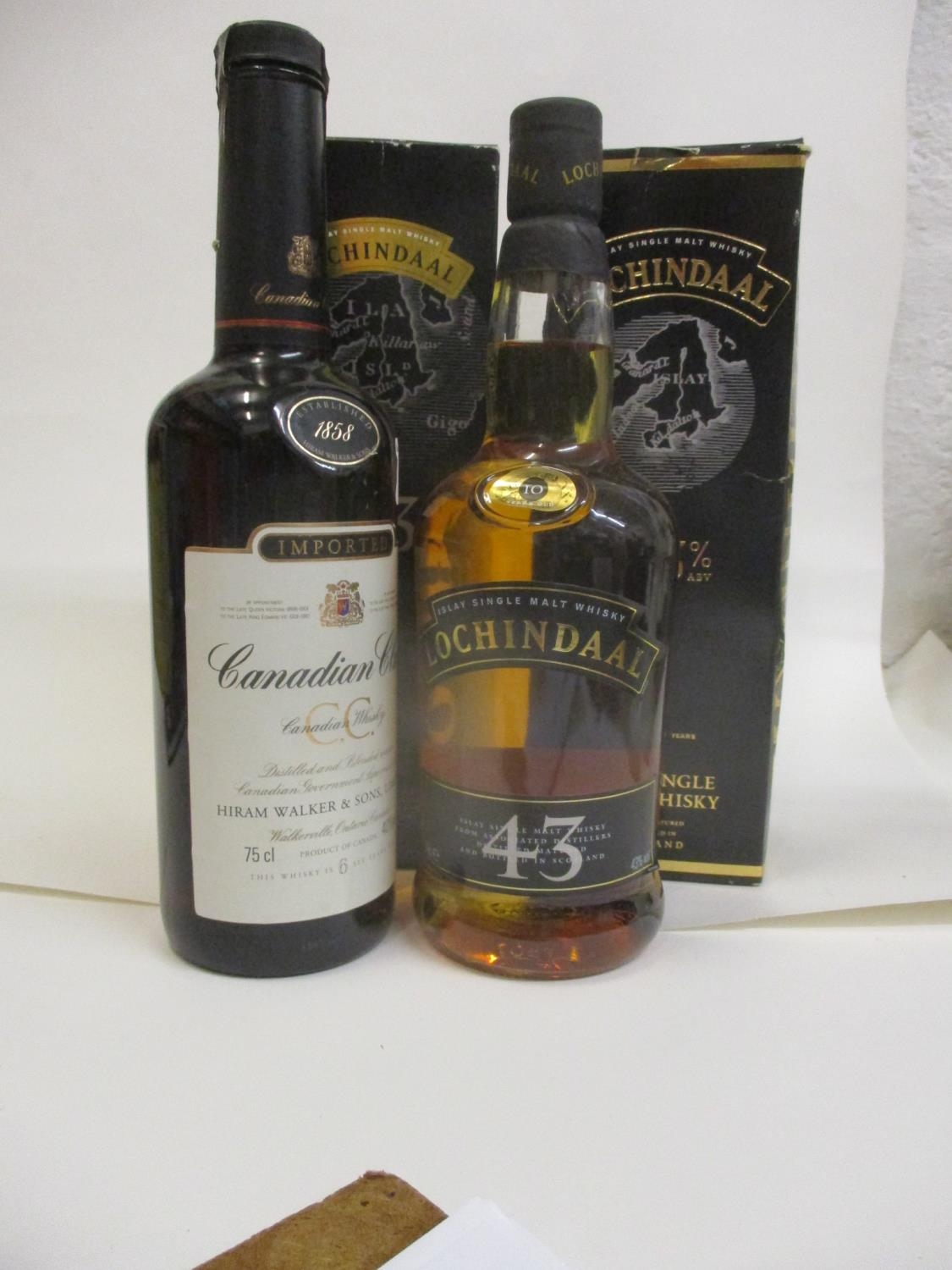 One bottle of Canadian Club whisky, 75cl, two bottles of Lochindaal