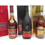 Three bottles of Cognac to include Martell and Remy Martin, 70cl