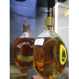 A single bottle of Dimple old blended scotch whisky and a bottle of Pinch Haig old blended scotch