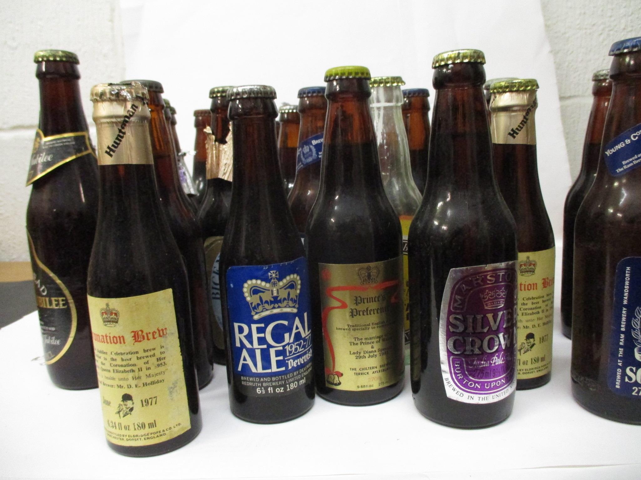 A collection of mixed beer bottles to include Silver Crown, A/F