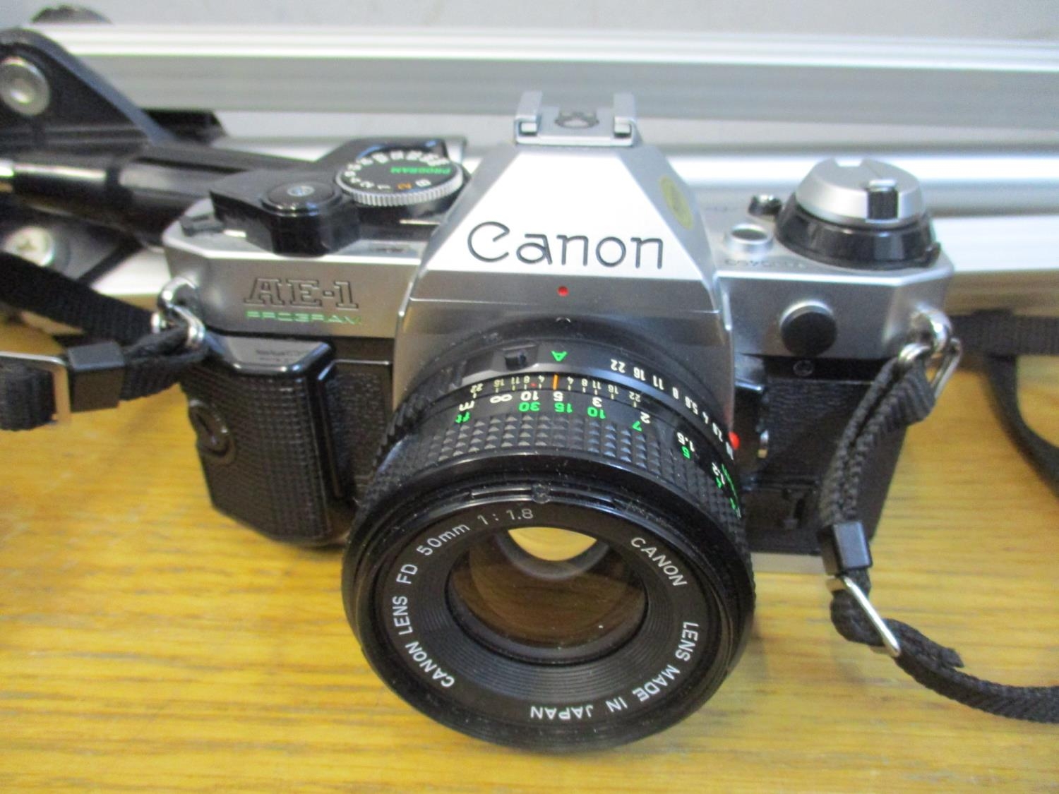 A Canon AE-1 camera, together with extra lens, fashion, tripod stand and a Yashica camera - Image 3 of 6