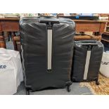 Two Samsonite 'Spinner' wheelie lightweight graduating suitcases with dust covers Location: RWB