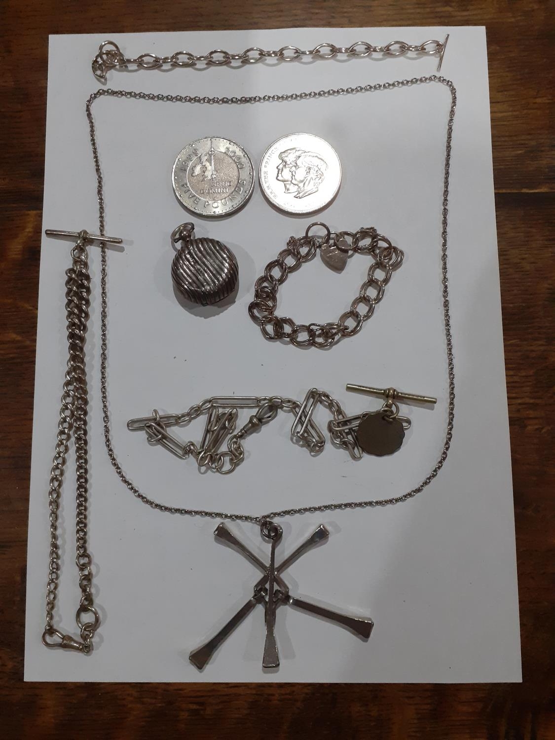 Mixed silver and white metal items to include watch chains, a contemporary necklace stamped with the