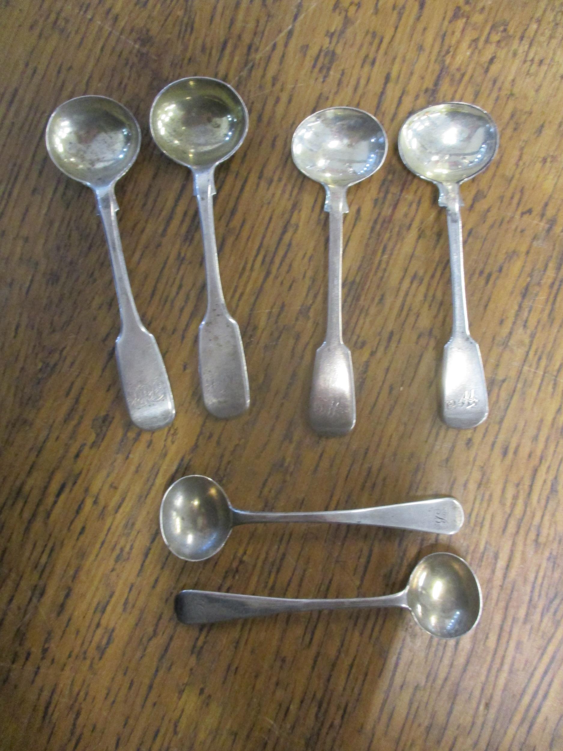 A pair of Scottish Georgian silver mustard spoons, a pair of Victorian Scottish silver mustard