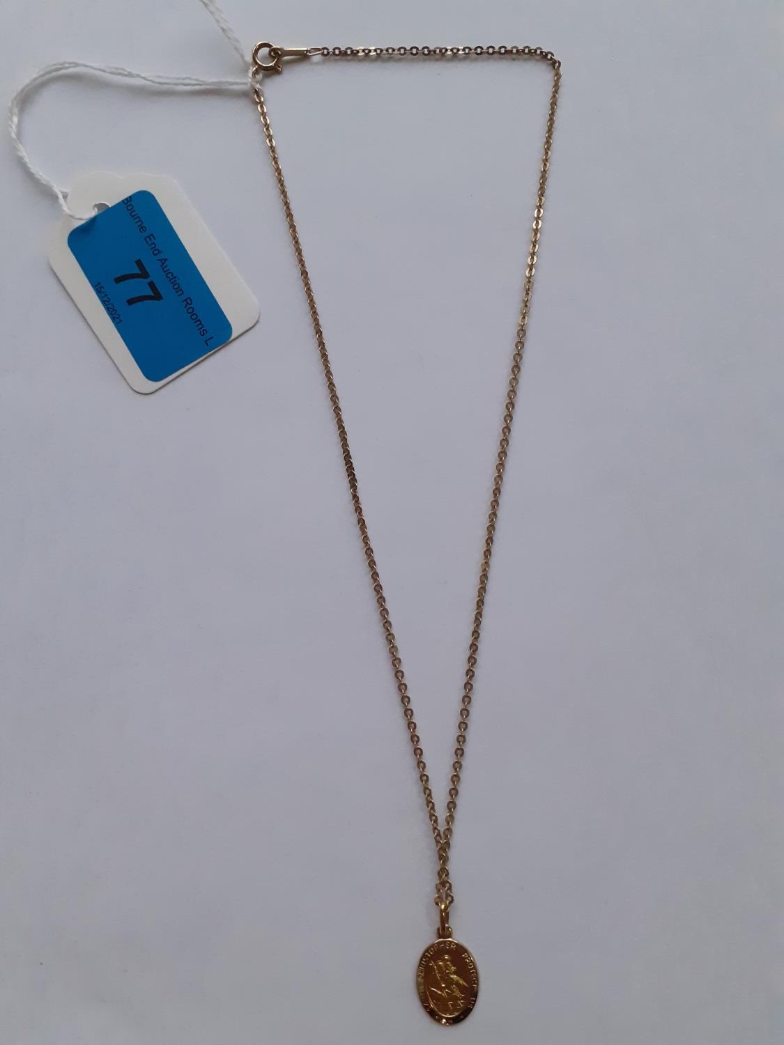 A 10ct gold chain having a 10ct gold St Christopher pendant, 4.0g - Image 2 of 3