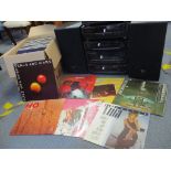 A Kenwood stacking system with speakers, together with LP records to include Fleetwood Mac, Rod