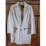 Versace Jeans Couture-A late 20th Century soft white leather ladies coat with zip detail to the back