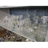 A mixed lot of table glass to include decanters and wine glasses, a Victorian green glass vase