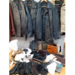 A quantity of ladies and gents coats and jackets, gents leather gloves, mixed hats and vintage bags,