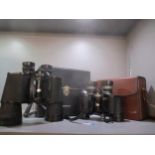 Tasco zoom 7 x 15 x 35 binoculars, model no 101 in leather case and another Tasco binoculars model