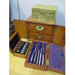 A mixed lot to include drawing implements, cased weights, two drawer oak box and a carved stone
