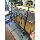 A Victorian wrought iron brass double bed frame, 137w