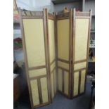 An early 20th century French walnut four fold screen with floral pattern, two tone, gold coloured