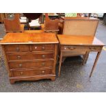 An early 20th century mahogany, string inlaid single drawer desk, together with a chest of two short