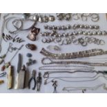 Silver and white metal costume jewellery to include multiple earrings, Mexican silver items, a small