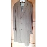 Aquascutum-A 1950's gents woollen coat in a brown and green herringbone, supplied to Moore & Wood of